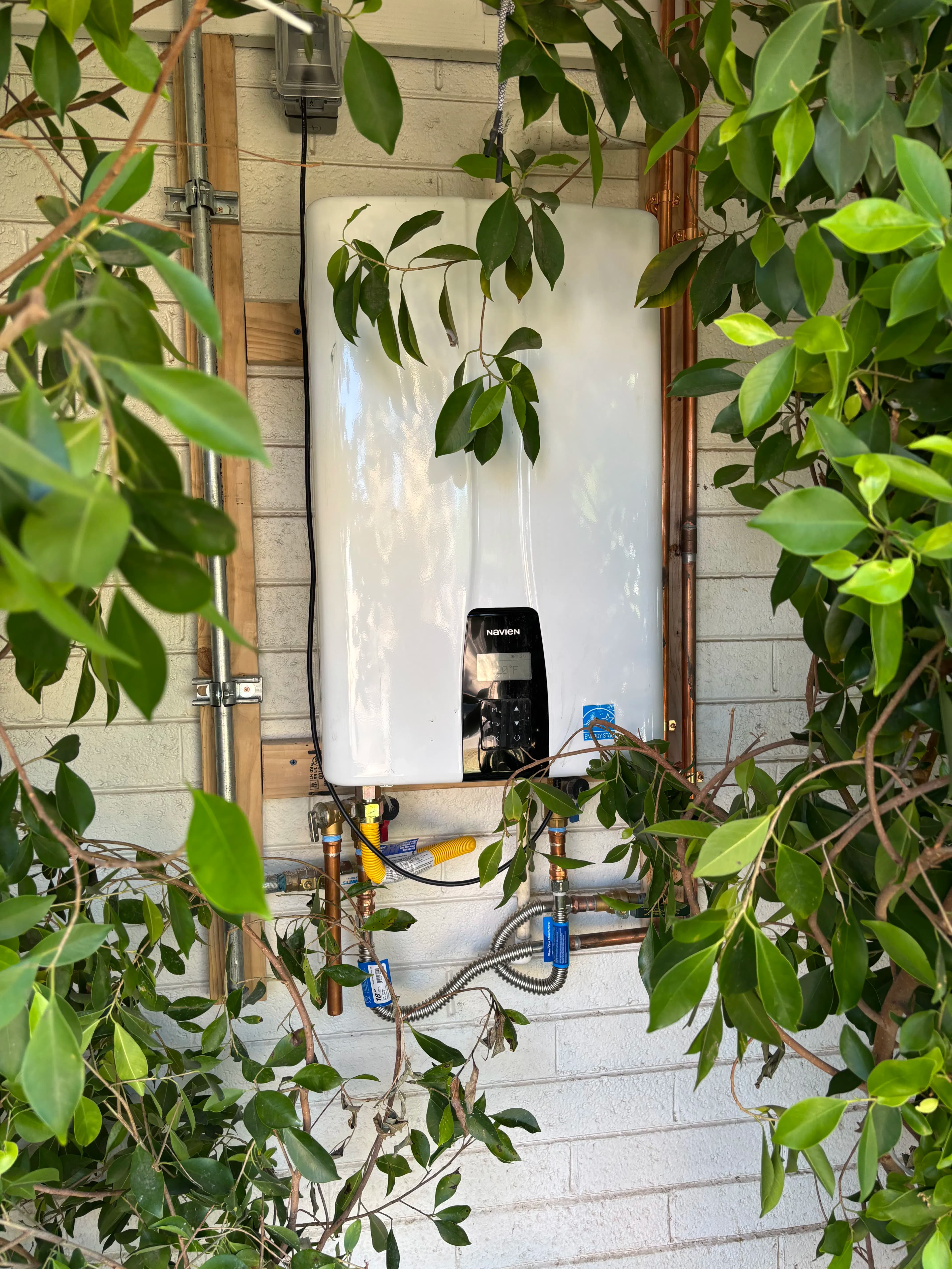 Project Moving a Tankless Water Heater Outside Frees Up Space Without Sacrificing Hot Water image