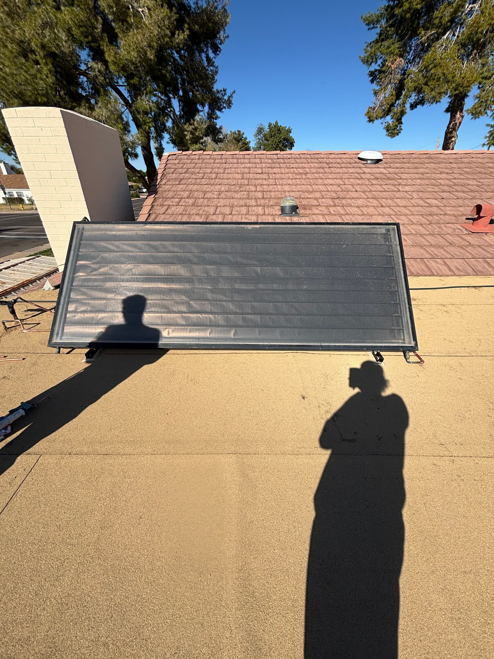 Solar Water Heater Removed and Reinstalled for Roofing Work image